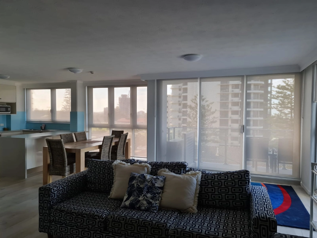 Sheer roller blinds in a living room