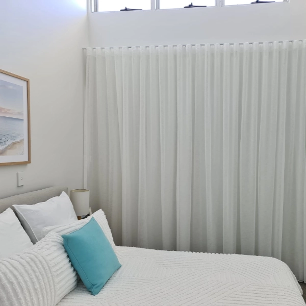 Blockout curtains in a Mermaid Waters bedroom