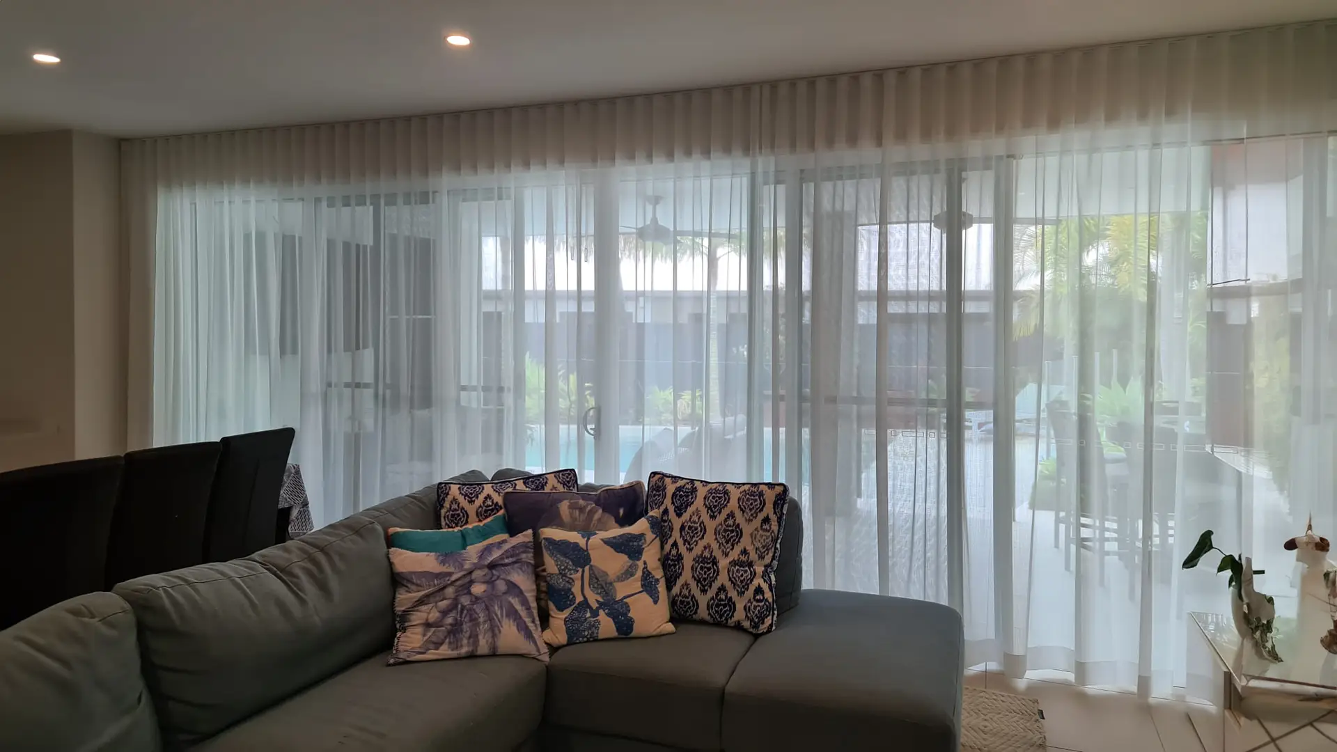 S-wave sheer curtains in a Mermaid Waters living room