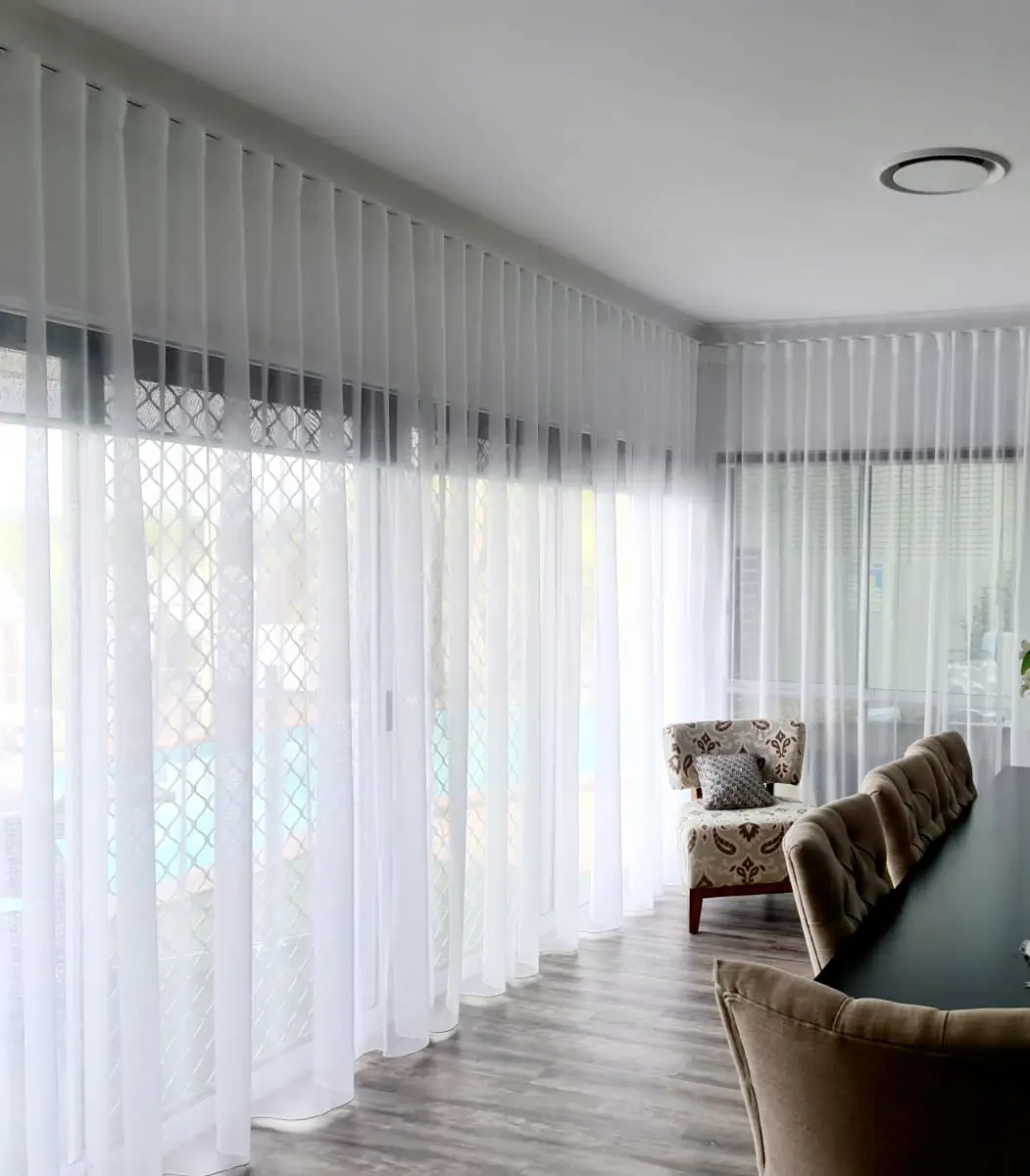 Sheer curtains in a Robina dining area