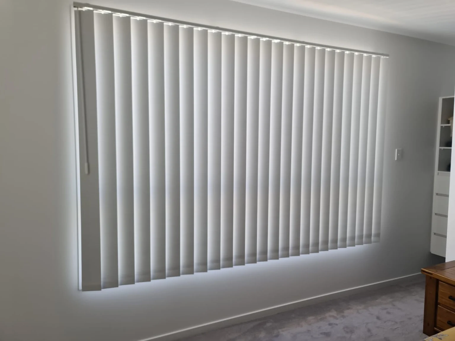 Vertical blinds in a Southport bedroom