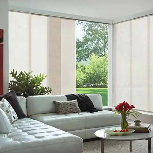 Panel glide blinds installed in a Gold Coast living room