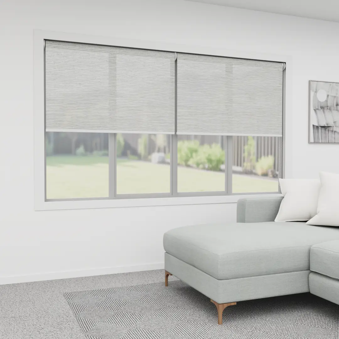 Light-filtering roller blind softly diffusing daylight in a bright living room