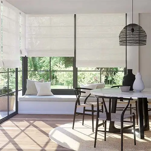 Roman blinds fitted in a modern dining room with filtered natural light