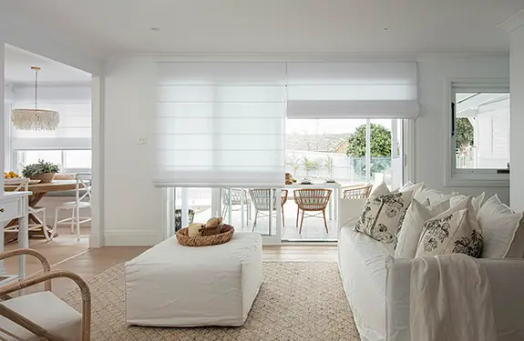 Soft translucent Roman blinds in a bright living area